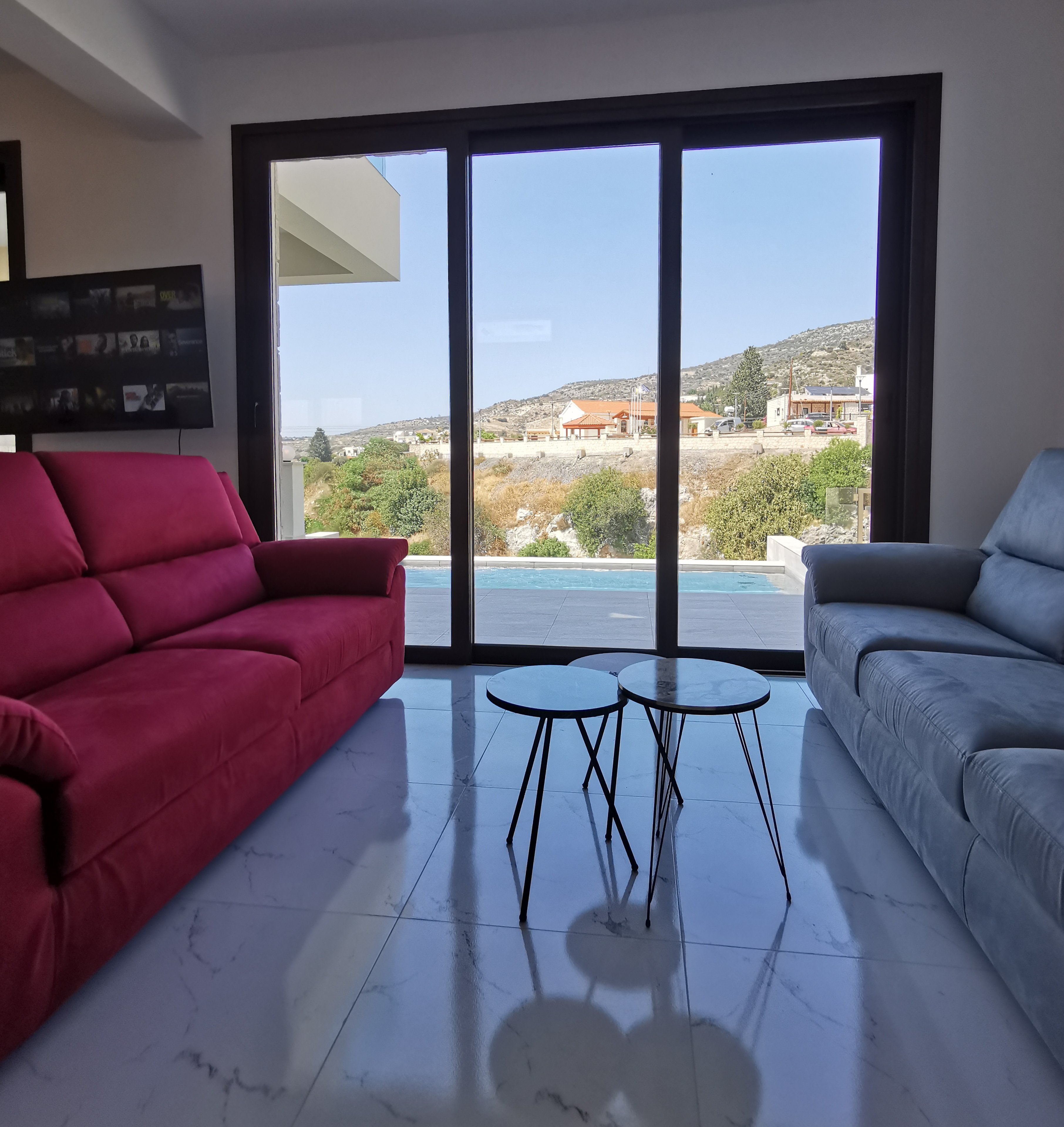 The Prince's living room accompanied by a view of the local church