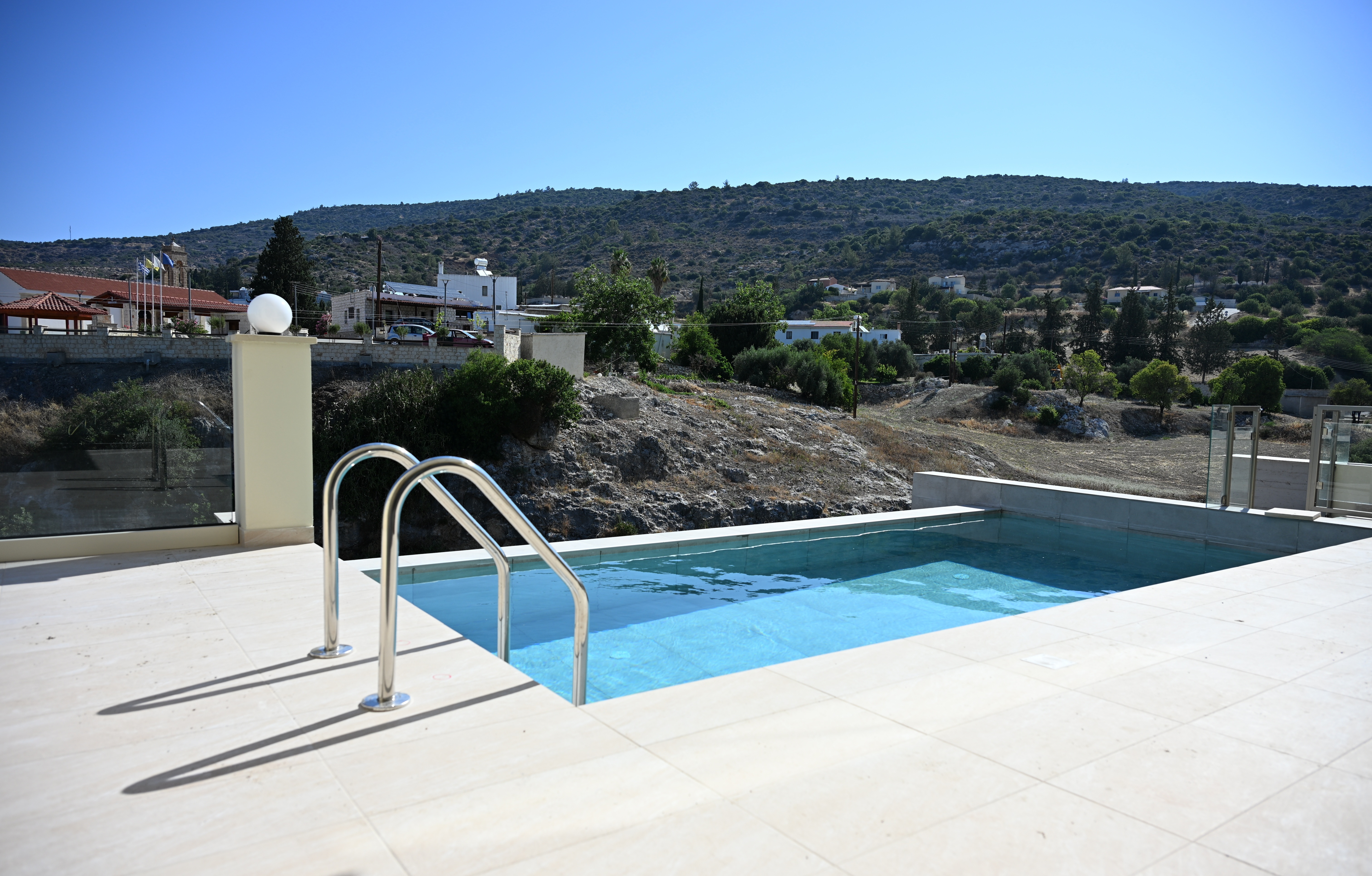 The Prince's pool accompanied by a wonderful view of the valley and the local church